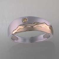 sterling silver and 18k yellow gold "Land, sea, sun" band. 