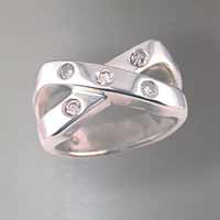 Sterling X design ring set with 5 round brilliant diamonds = .35 carat total weight.