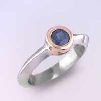 Sterling/14k ring set with one round brilliant cut genuine fine blue sapphire