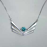 necklace with a blue diamond